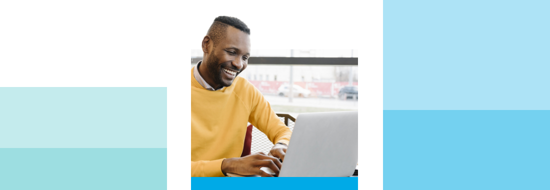 A happy man using Blackboard LMS for his training
